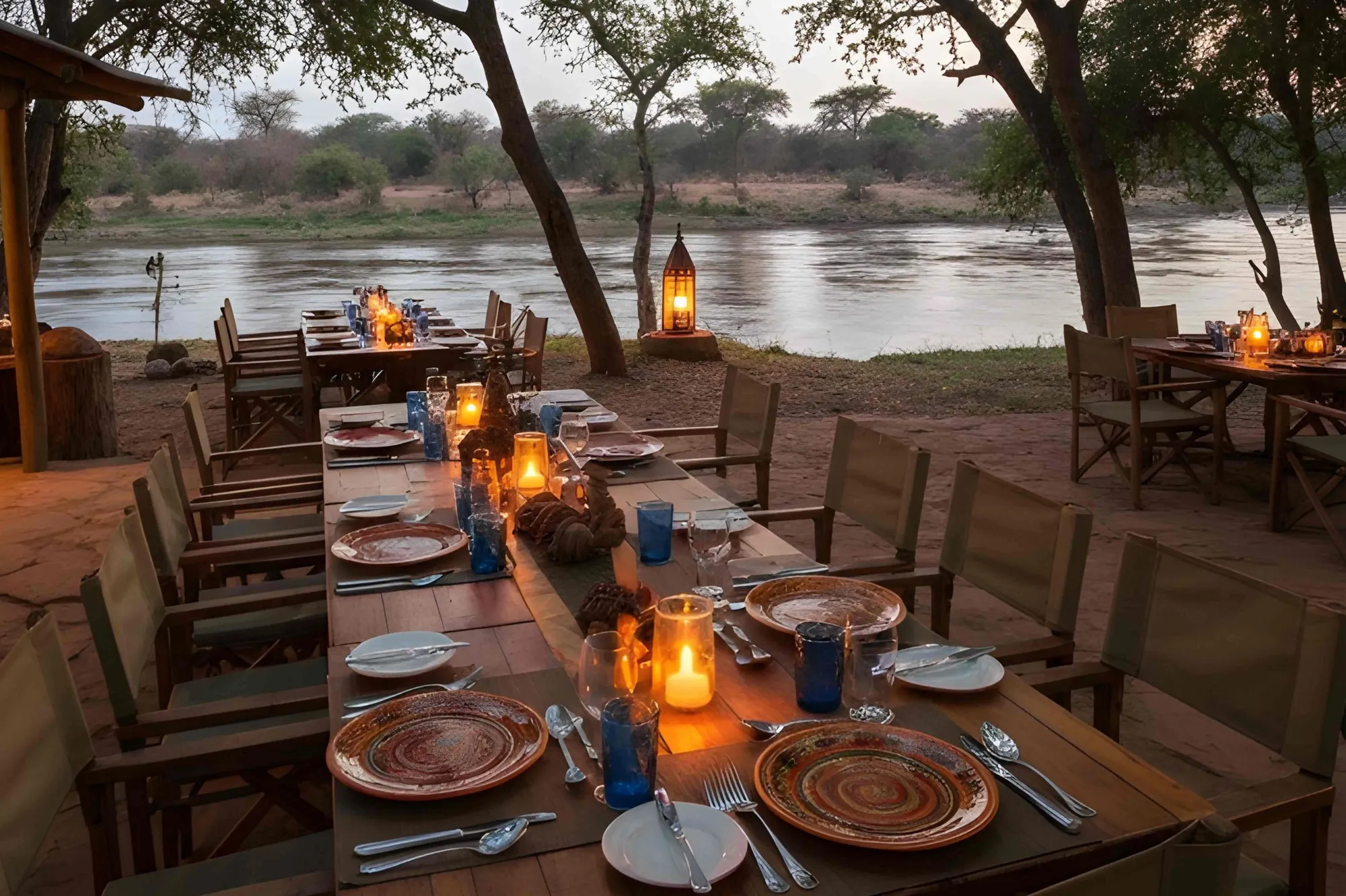 Camp Kwando - Riverside dinner at dusk