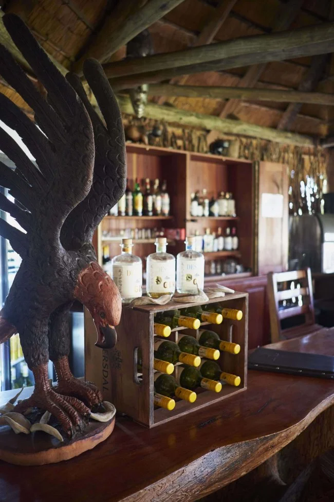 Bar with Eagle Sculpture and Wines