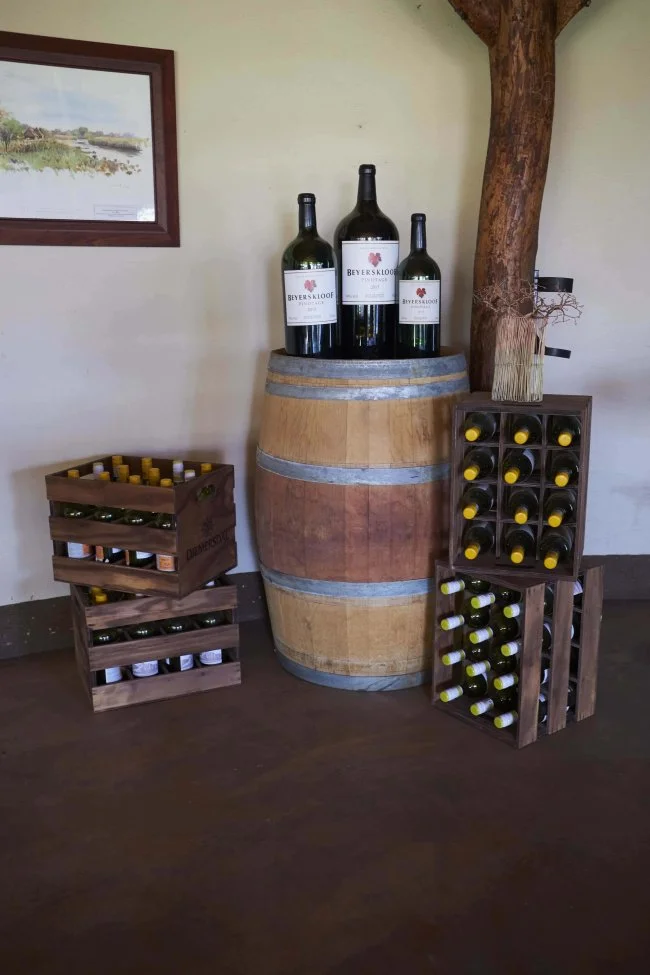 Wine Barrel and Bottles Display